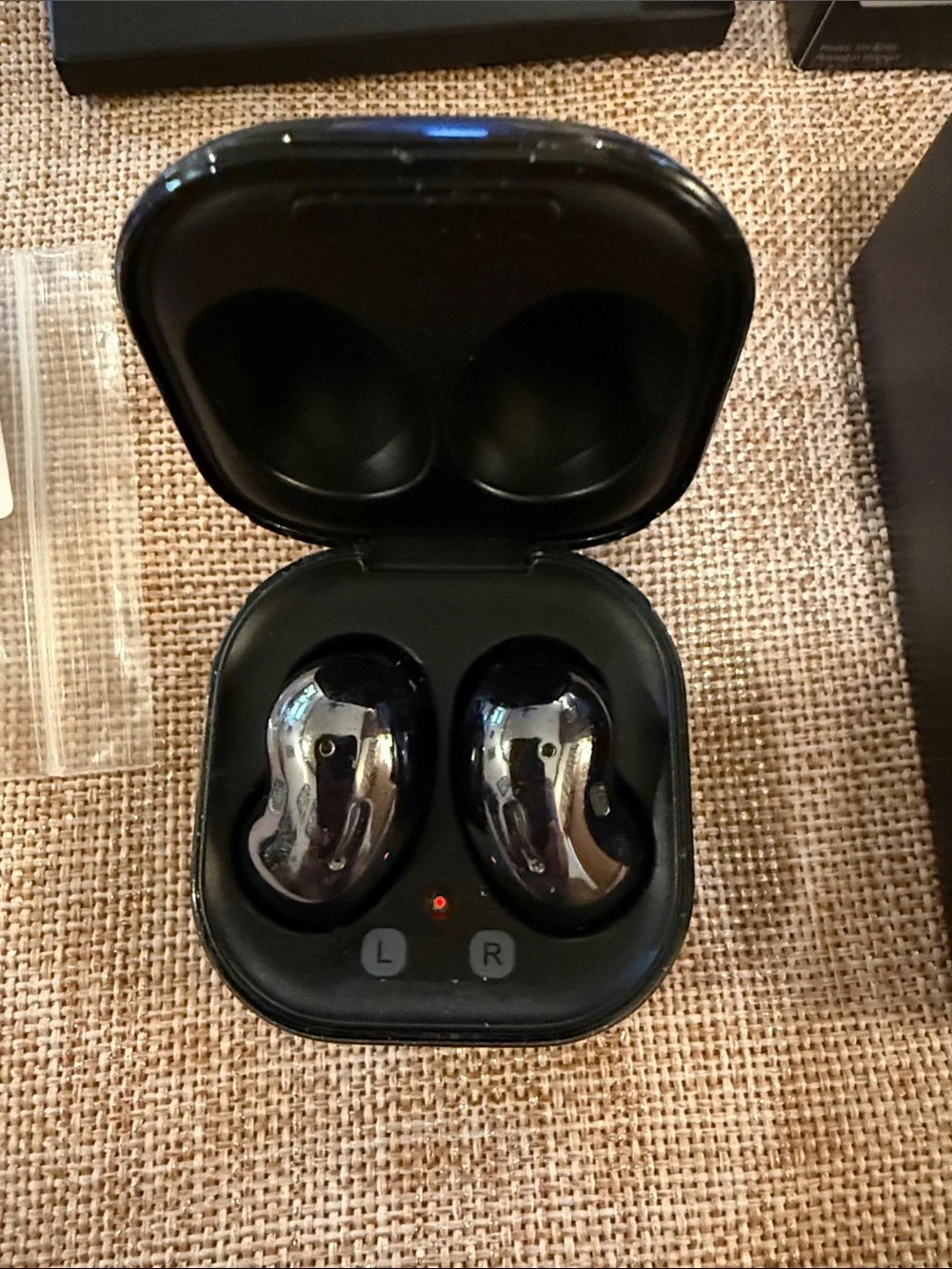 Samsung Galaxy Buds Pro in reflective silver and black
